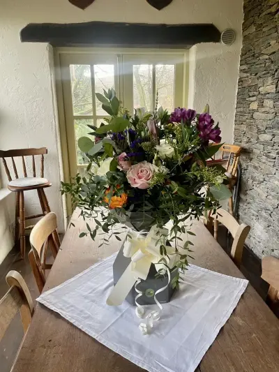 A wild seasonal bouquet in a vase