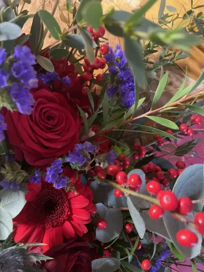 Red roses and berries for winter