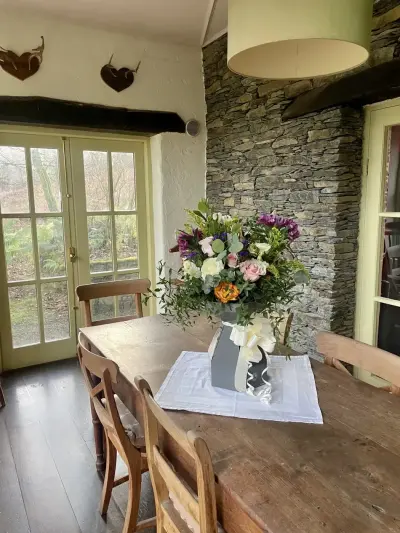 A hand-tied bouquet on a farmhouse table