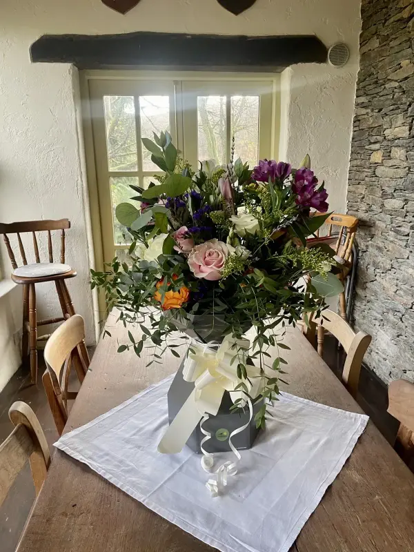 A wedding table arrangement in a country house